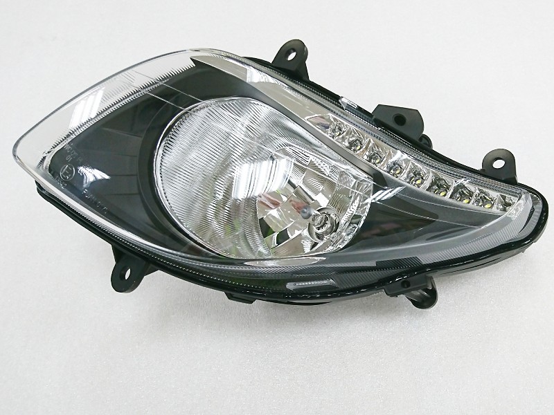 Фара передняя левая SYM