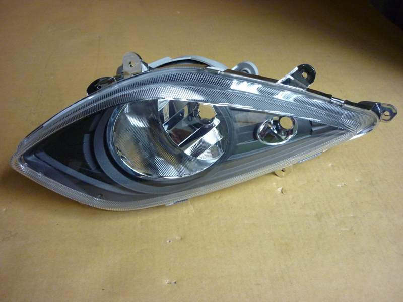 Модуль головного света левый SYM