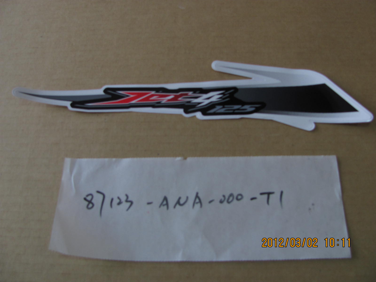 Наклейка на пластик передний правый SYM