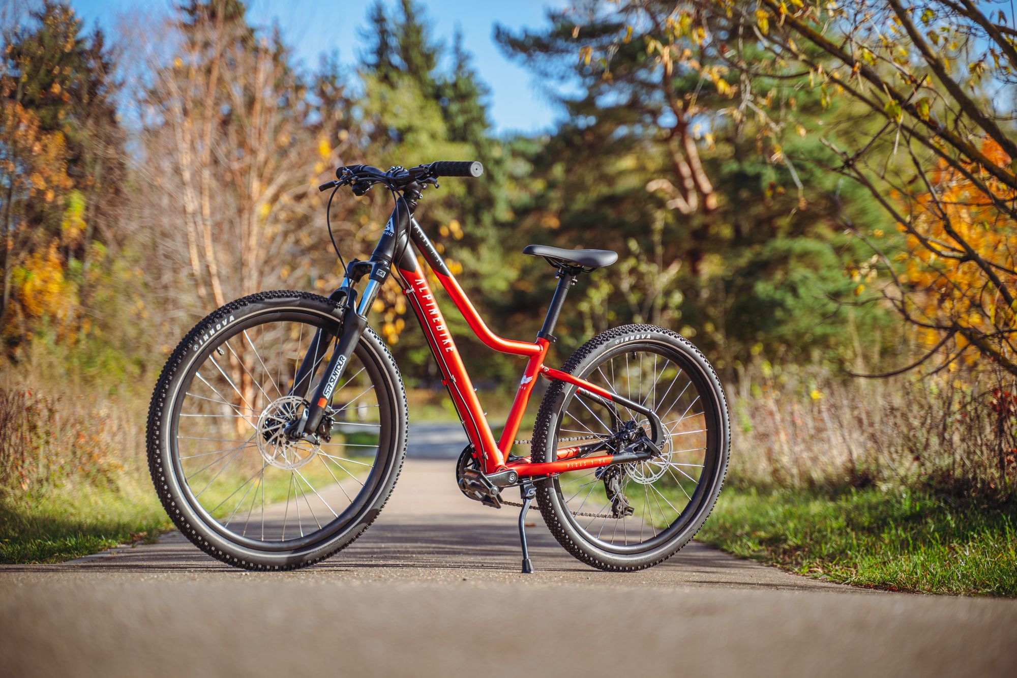 Велосипед подростковый Alpinebike Pegas 7-24 рассветный оранжевый